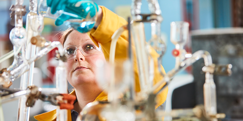 female lab technician performing product testing