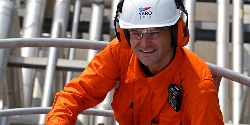 Smiling male engineer at a storage terminal