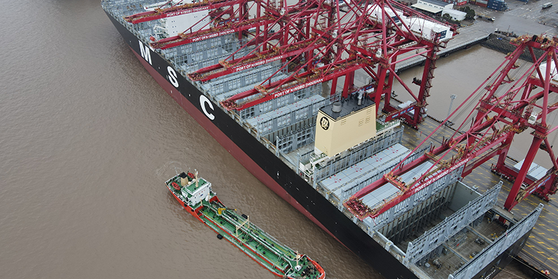 Bunker barge at ship terminal